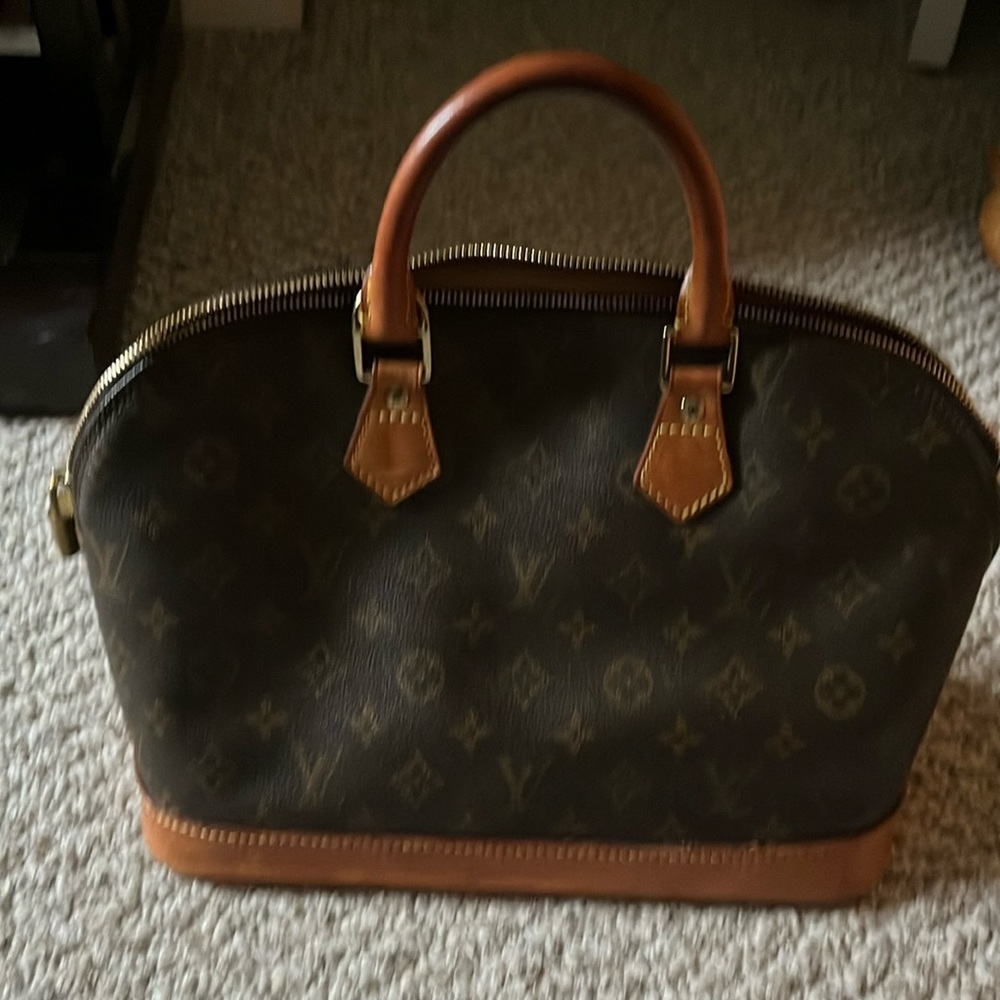 Louis Vuitton Alma bag excellent condition